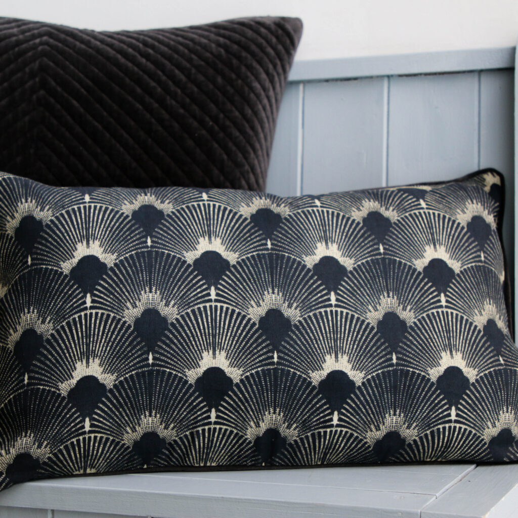 This image features the House Doctor Cushion cover, a scalloped design in cream and navy with a 1920s design.
