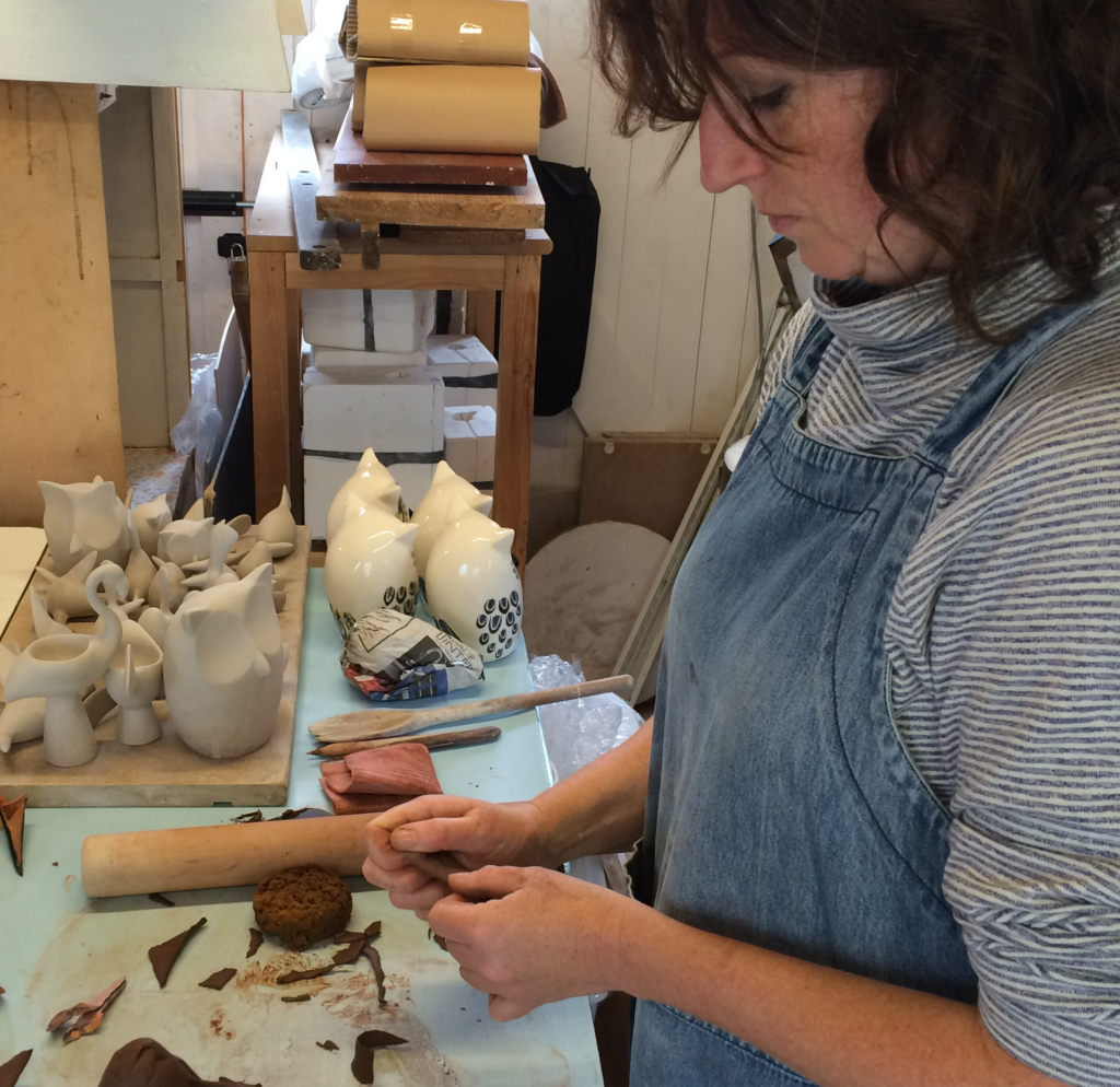 Image features Hannah Turner working in her studio